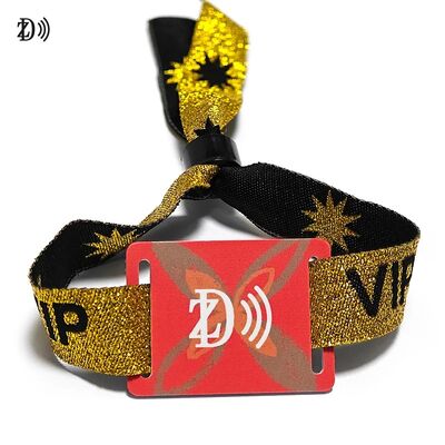 कस्टम एनएफसी 13.56 मेगाहर्ट्ज डिस्पोजेबल फैब्रिक रिस्टबैंड S50 चिप आरएफआईडी ब्रेसलेट इवेंट पार्टी एक्सेस कंट्रोल के लिए